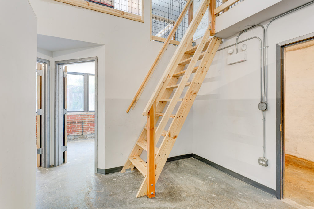 Picture of a studio room with staircase