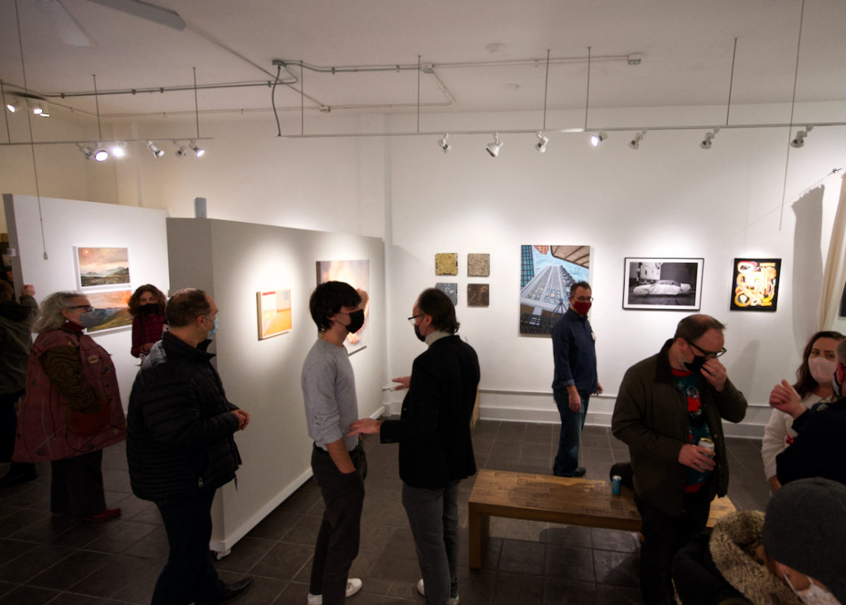 Overhead view of guests enjoying an exhibition